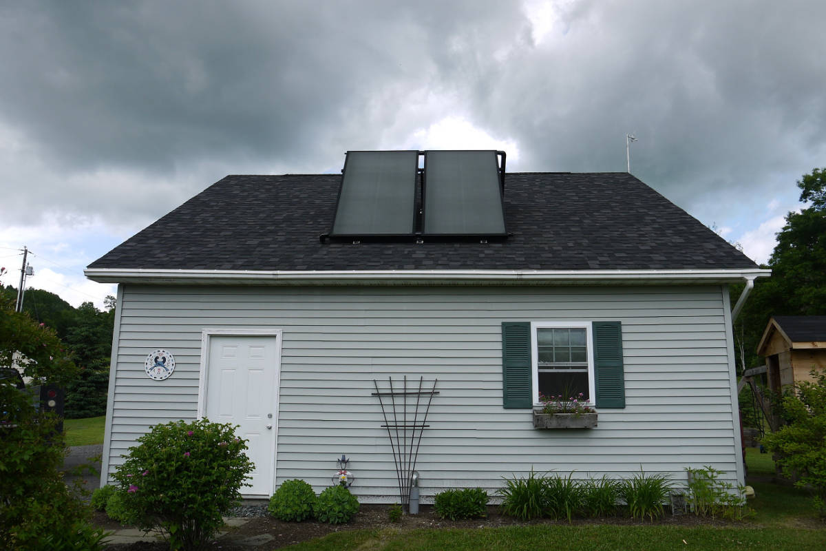 Photo of a home with solar hot water panels